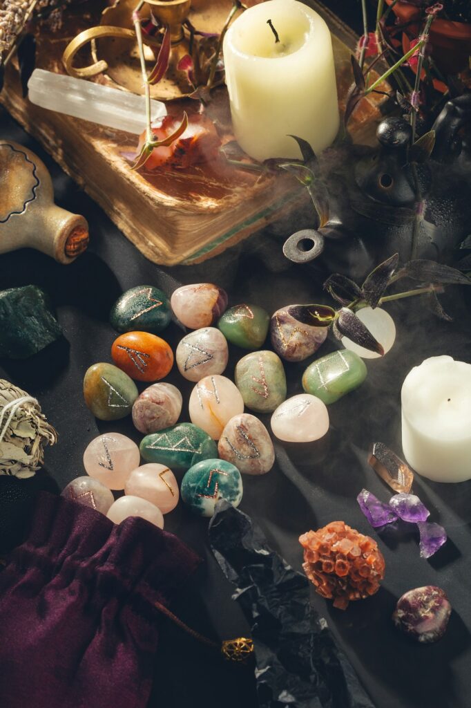 Esoteric Occult Altar with Runes Stones on Black